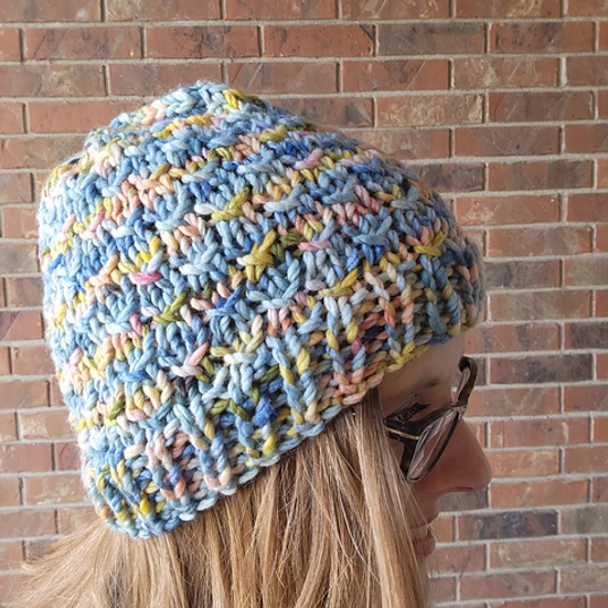 Woodland Cabin Chunky Knit Beanie Pattern Stitch in blue yarn