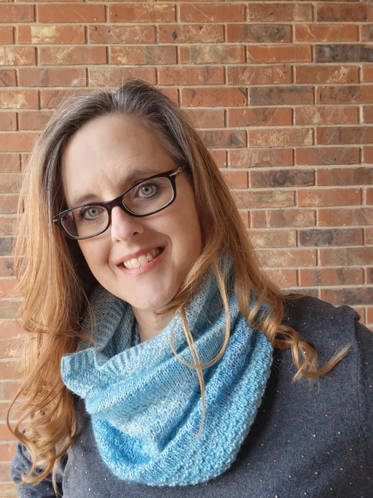 Twisted Textures Knit Cowl Pattern in blue yarn