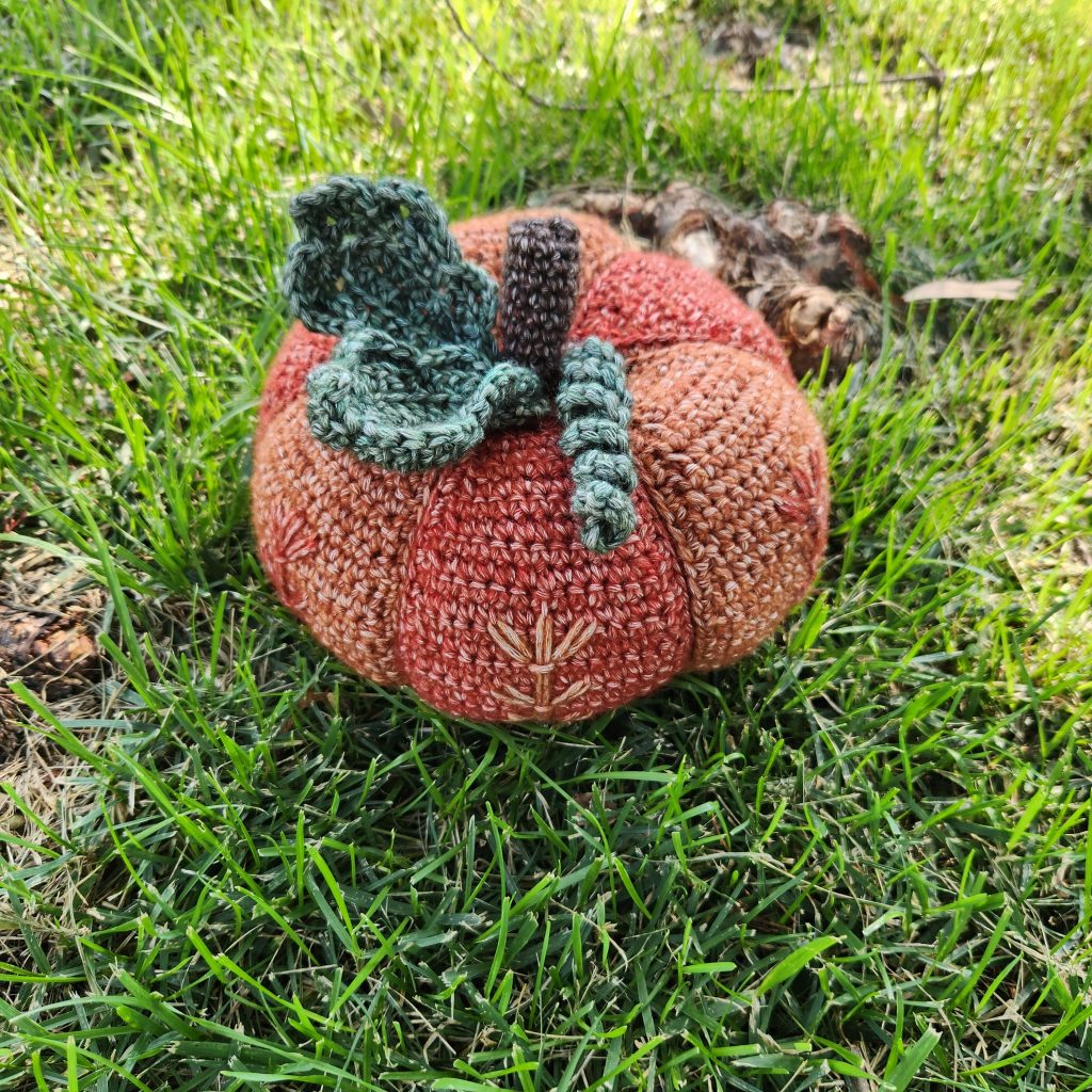 Top view of the leaves and stem on a crochet fall pumpkin